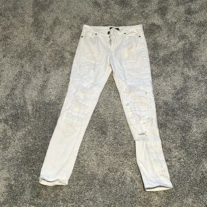 Ripped white skinny jeans